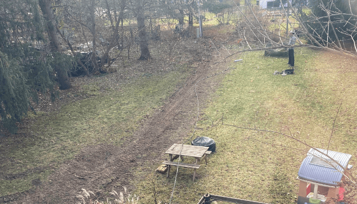 A photo of Bentley's back yard, where he buried electrical cables with the help of DTE Energy to increase reliability and safety. 