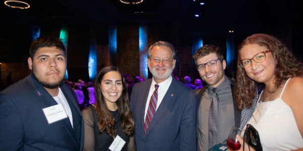 Ernesto (far left) with Senator Gary Peters and other Our Water Activists at Michigan LCV's Detroit Gala. 